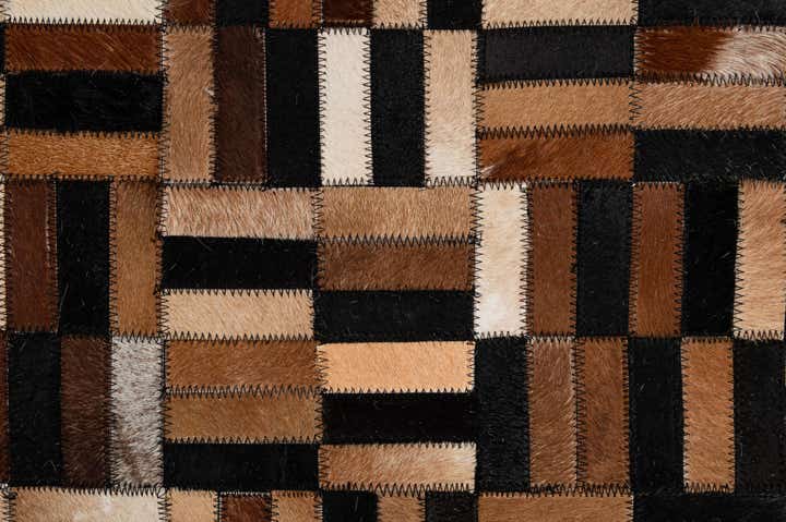 4' 11 x 7' 10 Cowhide - Patchwork Rug