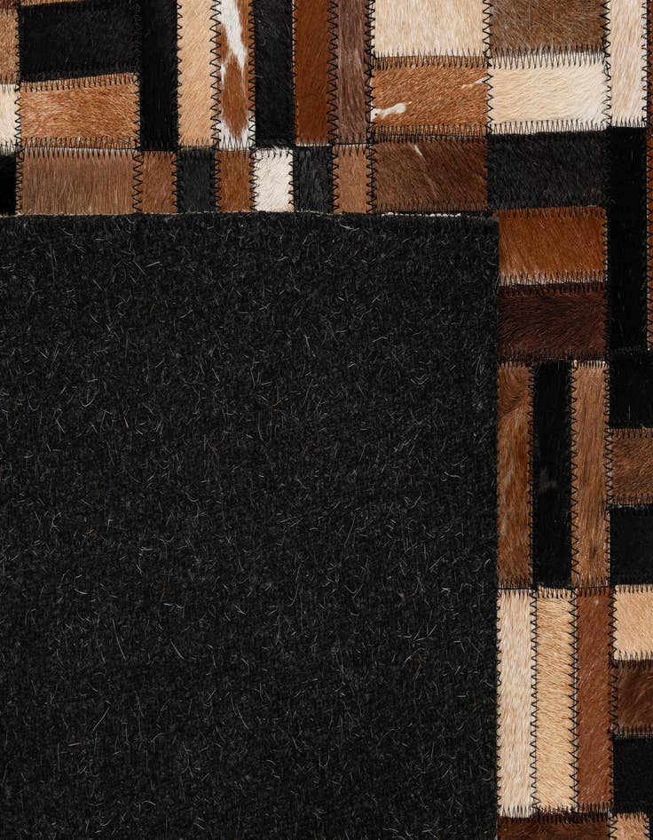 Detail image of 4' 11 x 7' 10 Cowhide - Patchwork Rug