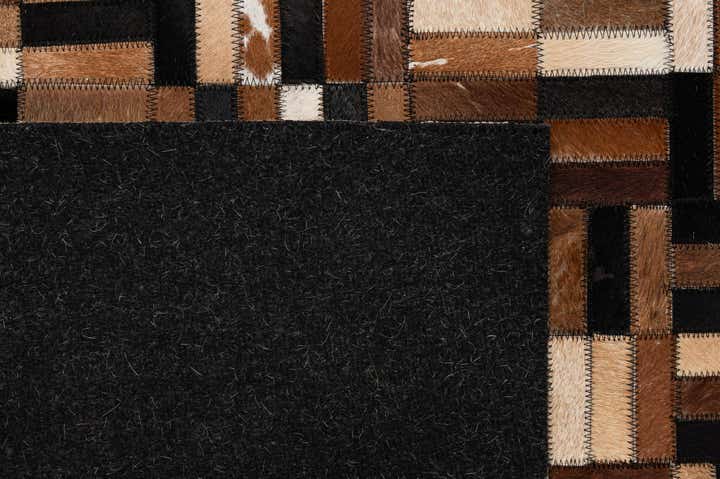 4' 11 x 7' 10 Cowhide - Patchwork Rug