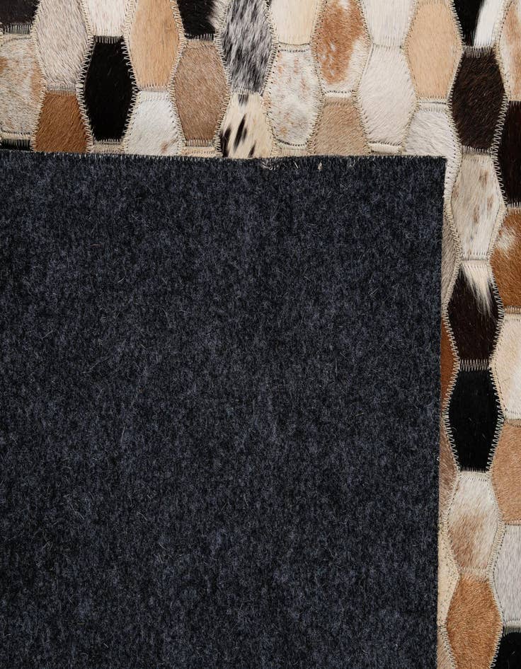 Detail image of 5' 1 x 7' 11 Cowhide - Patchwork Rug