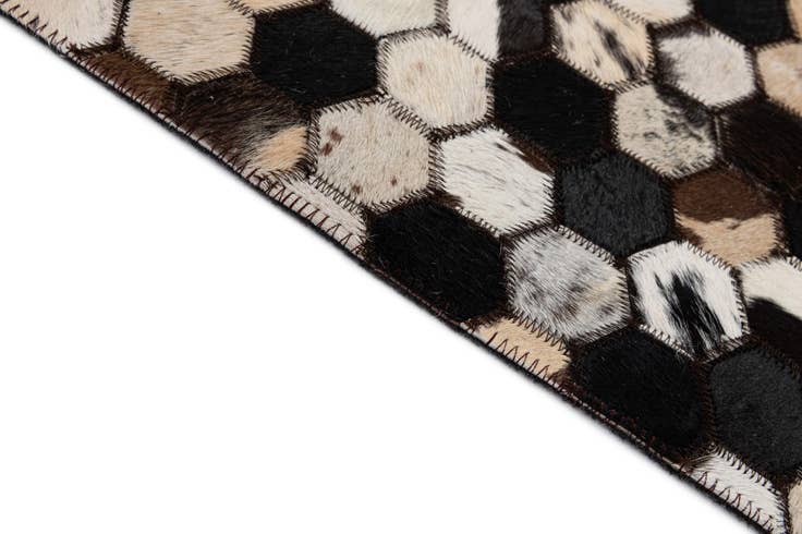 Detail image of 5' 1 x 8' Cowhide - Patchwork Rug