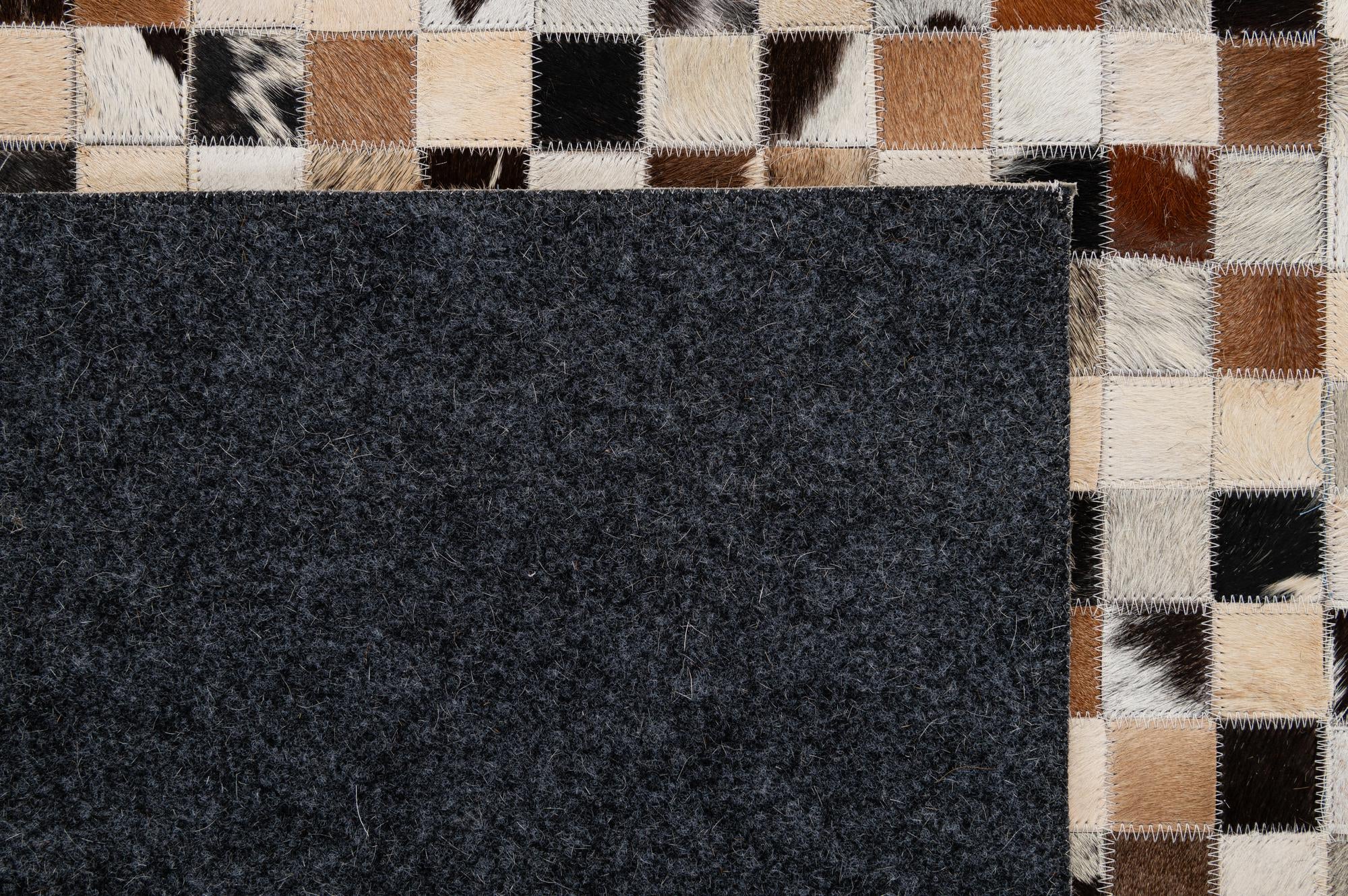 4' 11 x 7' 10 Cowhide - Patchwork Rug