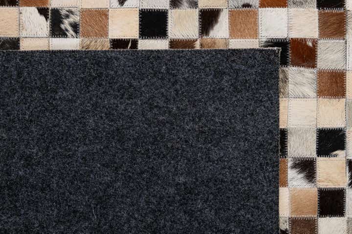 4' 11 x 7' 10 Cowhide - Patchwork Rug