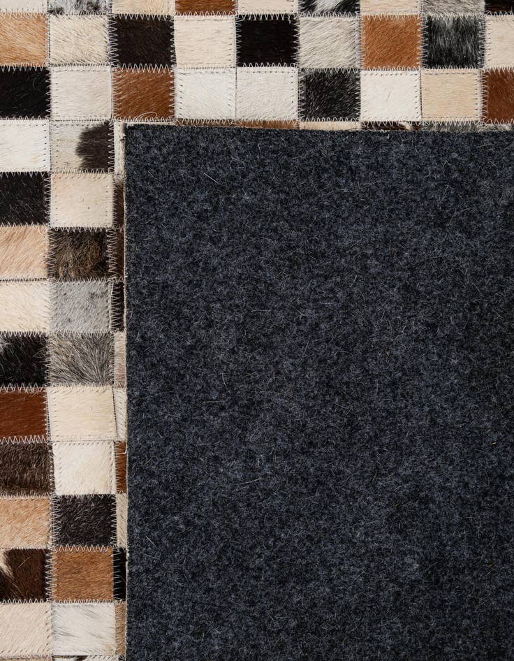 Detail image of 5' x 7' 11 Cowhide - Patchwork Rug