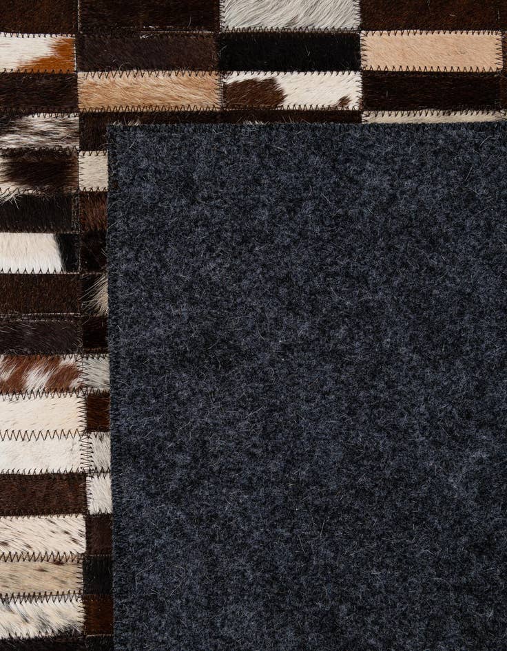 Detail image of 5' x 7' 11 Cowhide - Patchwork Rug
