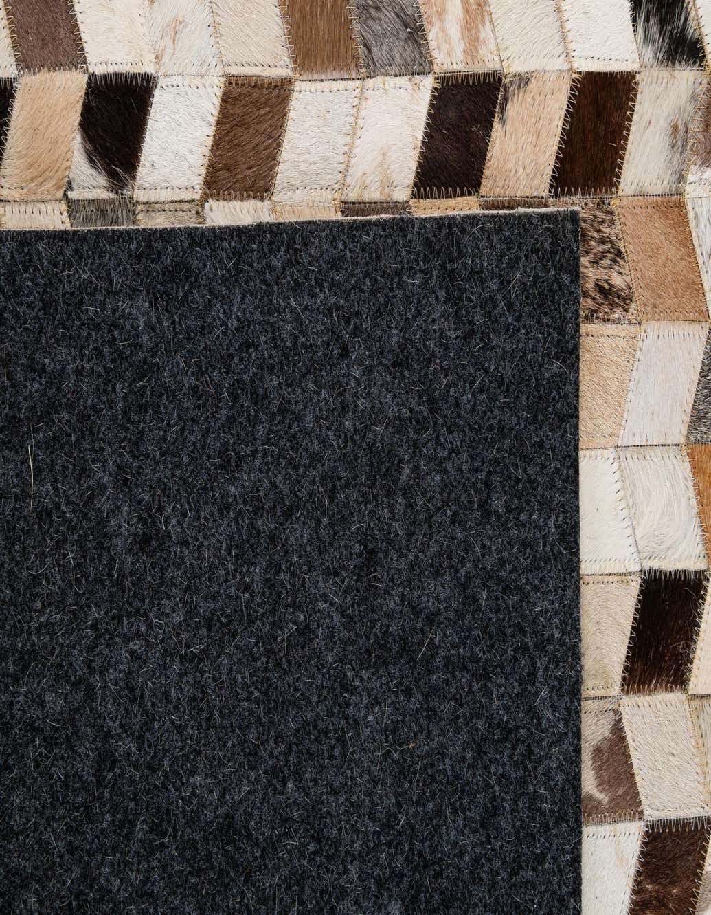 5' x 7' 11 Cowhide - Patchwork Rug