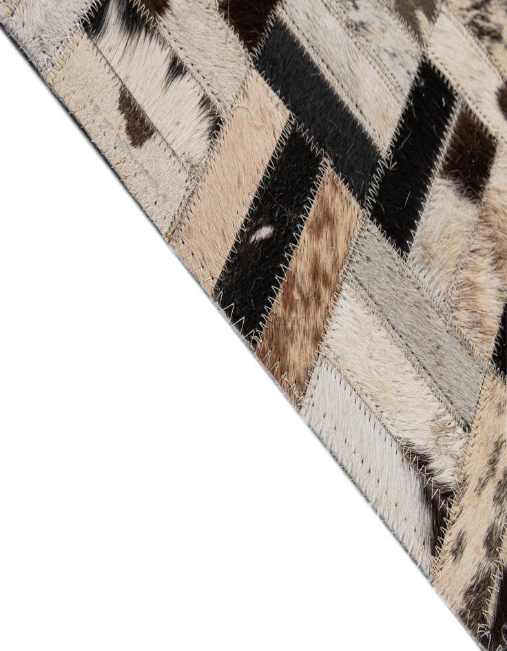 Detail image of 5' x 7' 11 Cowhide - Patchwork Rug