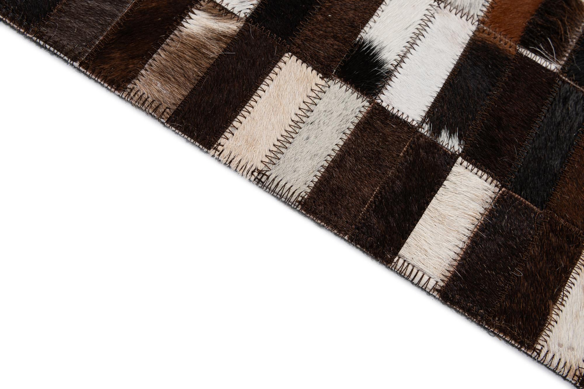 4' 11 x 8' 1 Cowhide - Patchwork Rug