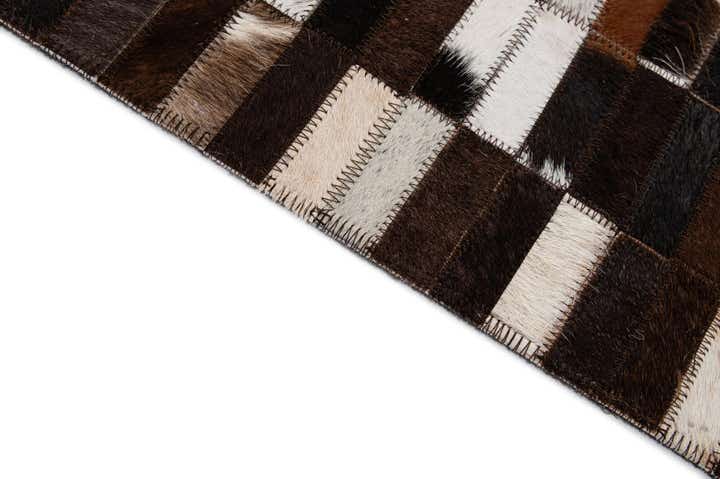 4' 11 x 8' 1 Cowhide - Patchwork Rug