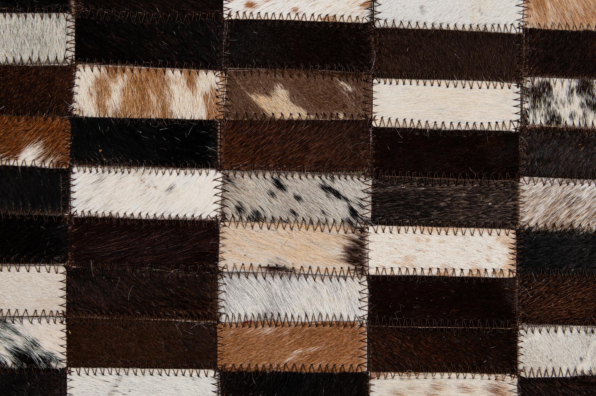 4' 11 x 8' 1 Cowhide - Patchwork Rug