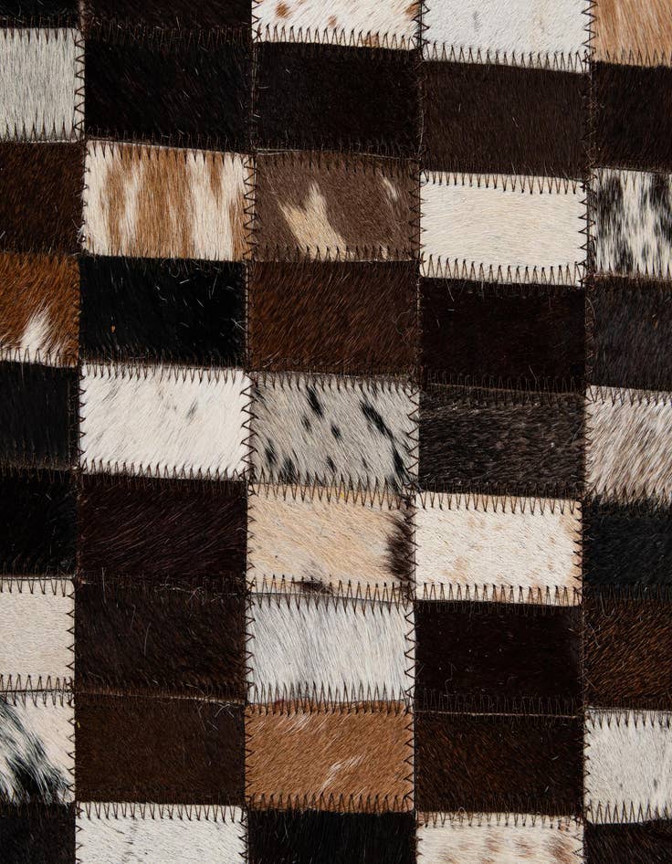 Detail image of 4' 11 x 8' 1 Cowhide - Patchwork Rug