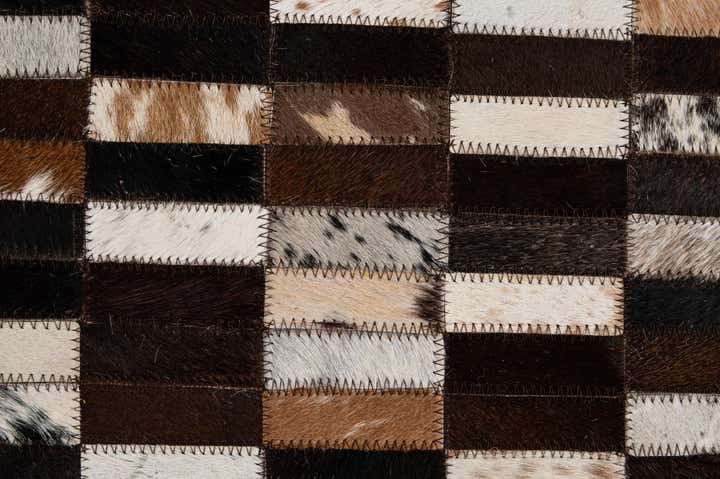 4' 11 x 8' 1 Cowhide - Patchwork Rug