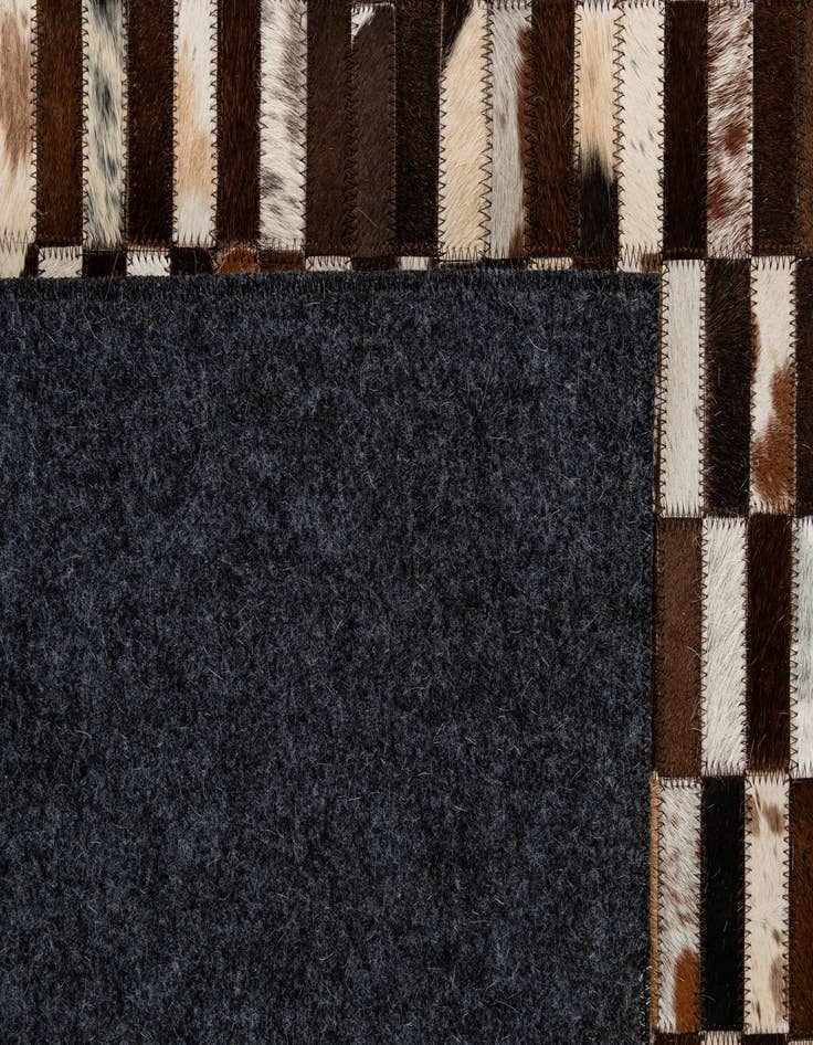 Detail image of 4' 11 x 8' 1 Cowhide - Patchwork Rug