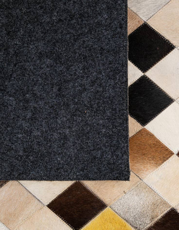 Detail image of 5' 1 x 8' Cowhide - Patchwork Rug