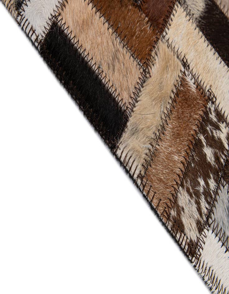 Detail image of 4' 11 x 7' 10 Cowhide - Patchwork Rug