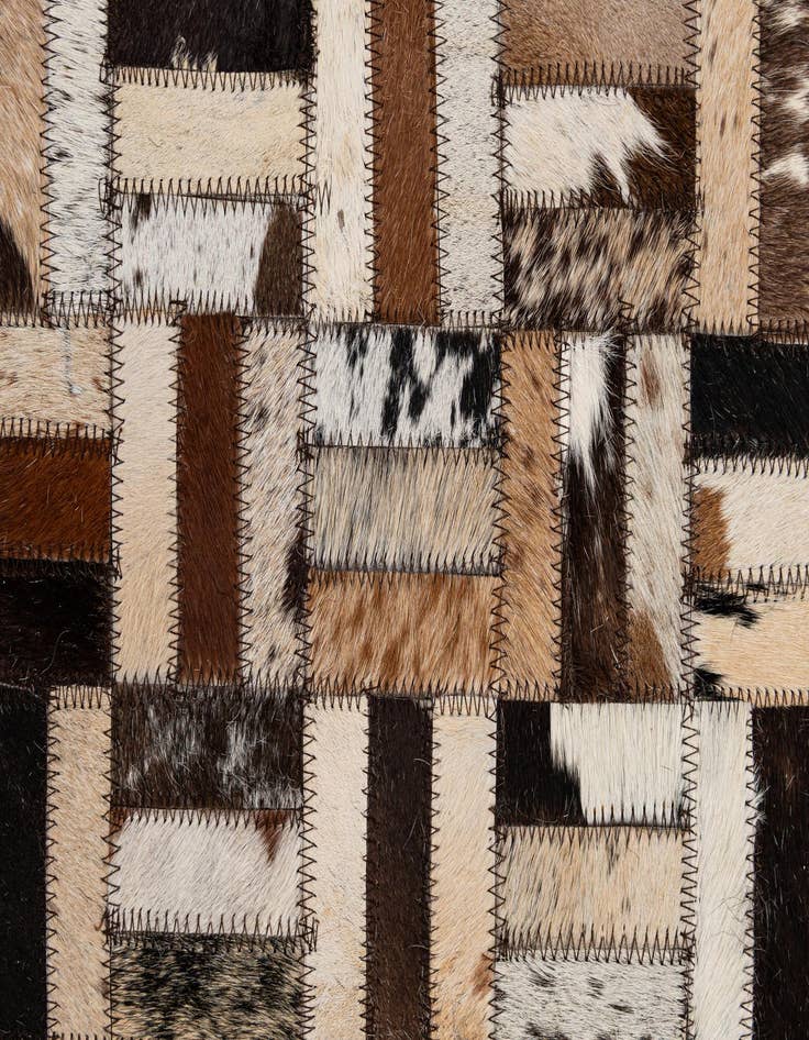 Detail image of 4' 11 x 7' 10 Cowhide - Patchwork Rug