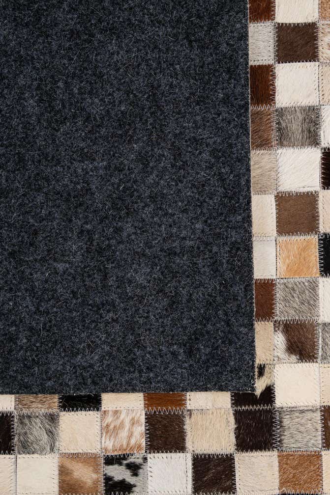 5' 2 x 7' 10 Cowhide - Patchwork Rug