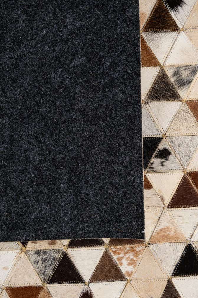5' 1 x 7' 11 Cowhide - Patchwork Rug
