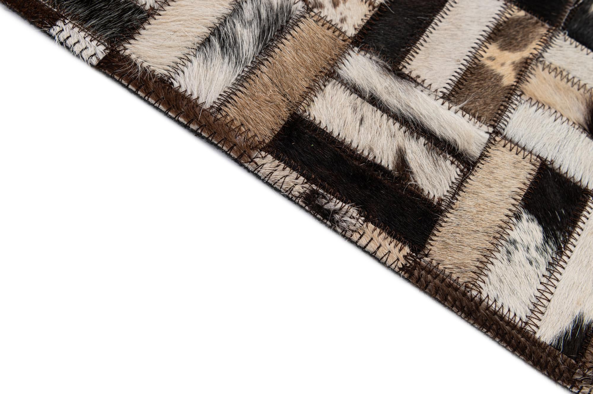 5' 2 x 7' 11 Cowhide - Patchwork Rug