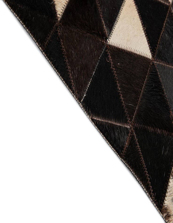 Detail image of 5' 1 x 7' 11 Cowhide - Patchwork Rug
