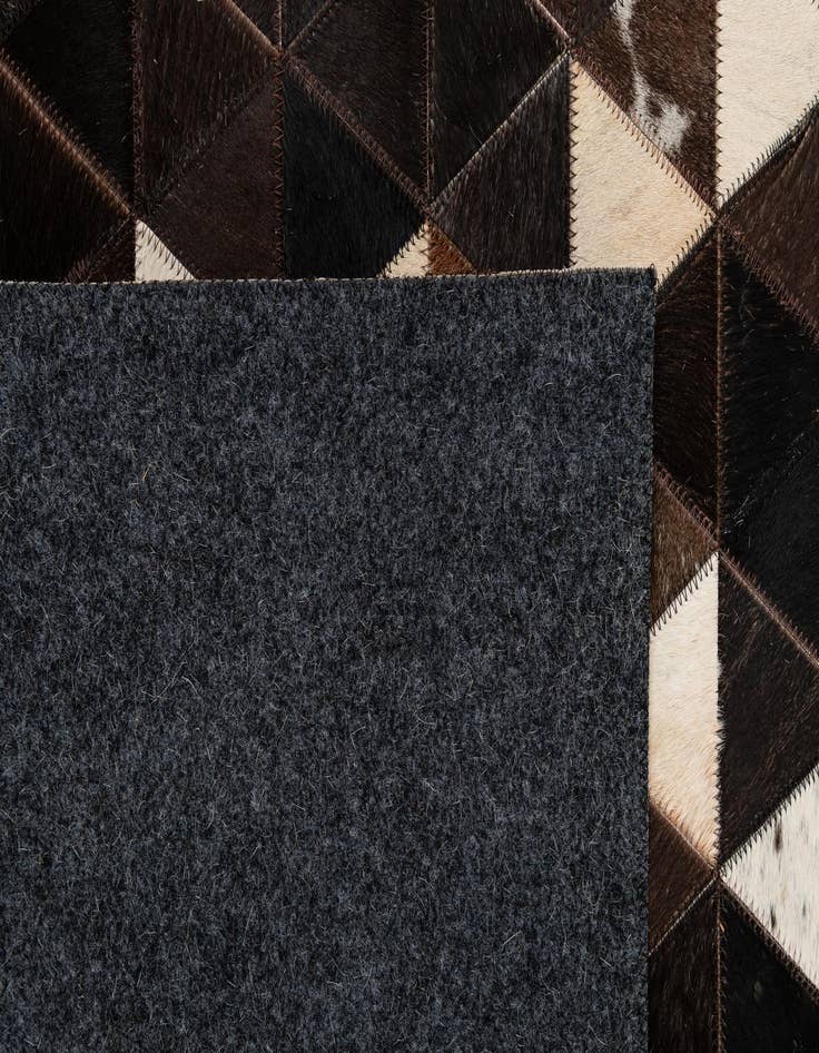 Detail image of 5' 1 x 7' 11 Cowhide - Patchwork Rug