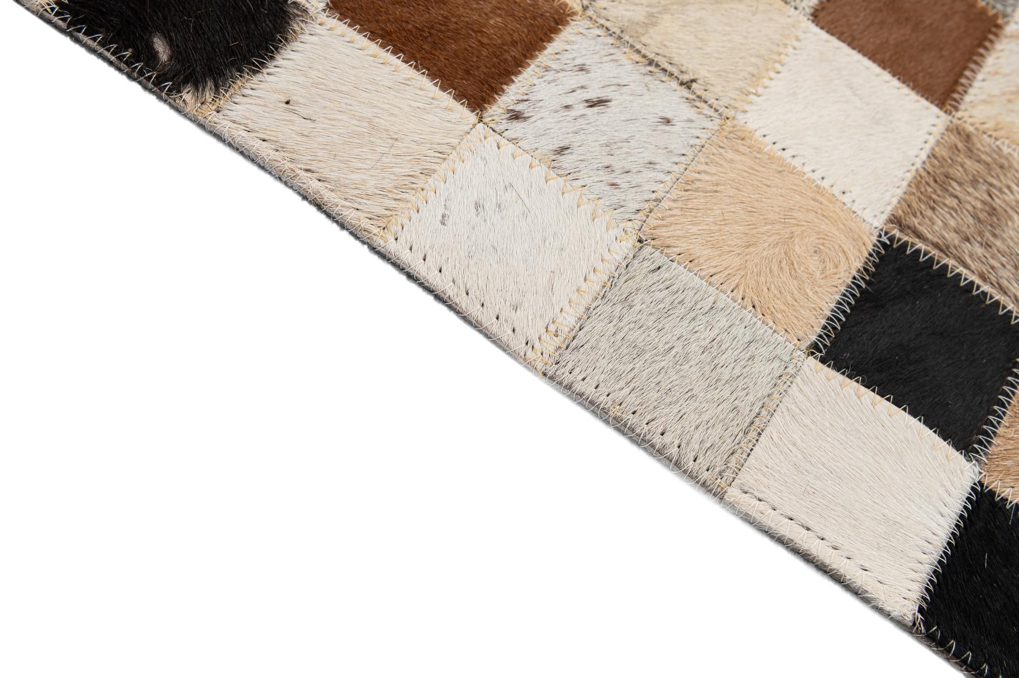 5' 1 x 7' 11 Cowhide - Patchwork Rug