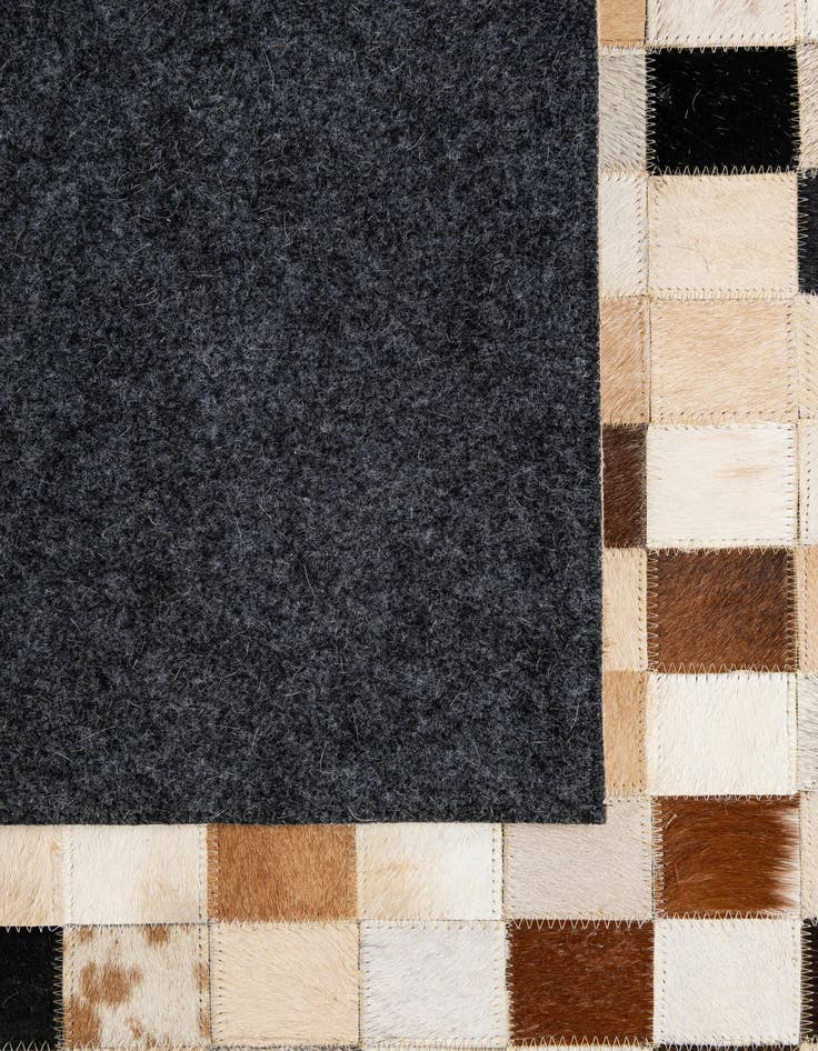 Detail image of 5' 1 x 7' 11 Cowhide - Patchwork Rug
