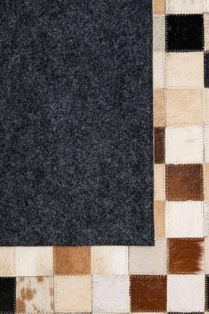 5' 1 x 7' 11 Cowhide - Patchwork Rug