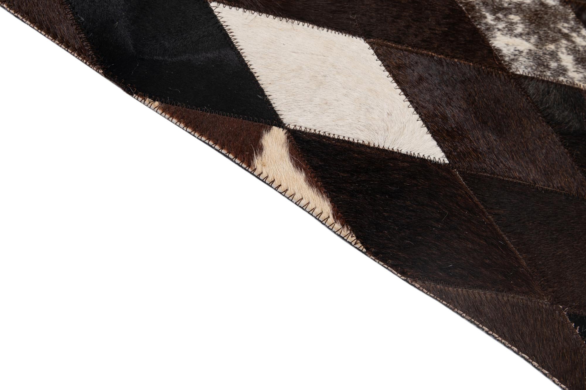 5' 9 x 8' Cowhide - Patchwork Rug