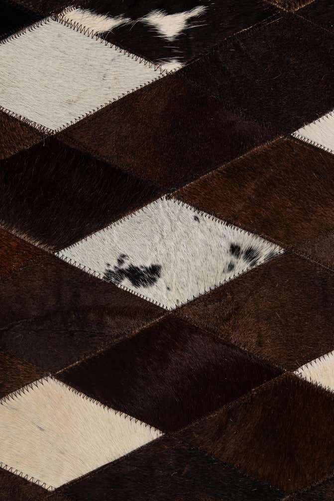 5' 9 x 8' Cowhide - Patchwork Rug