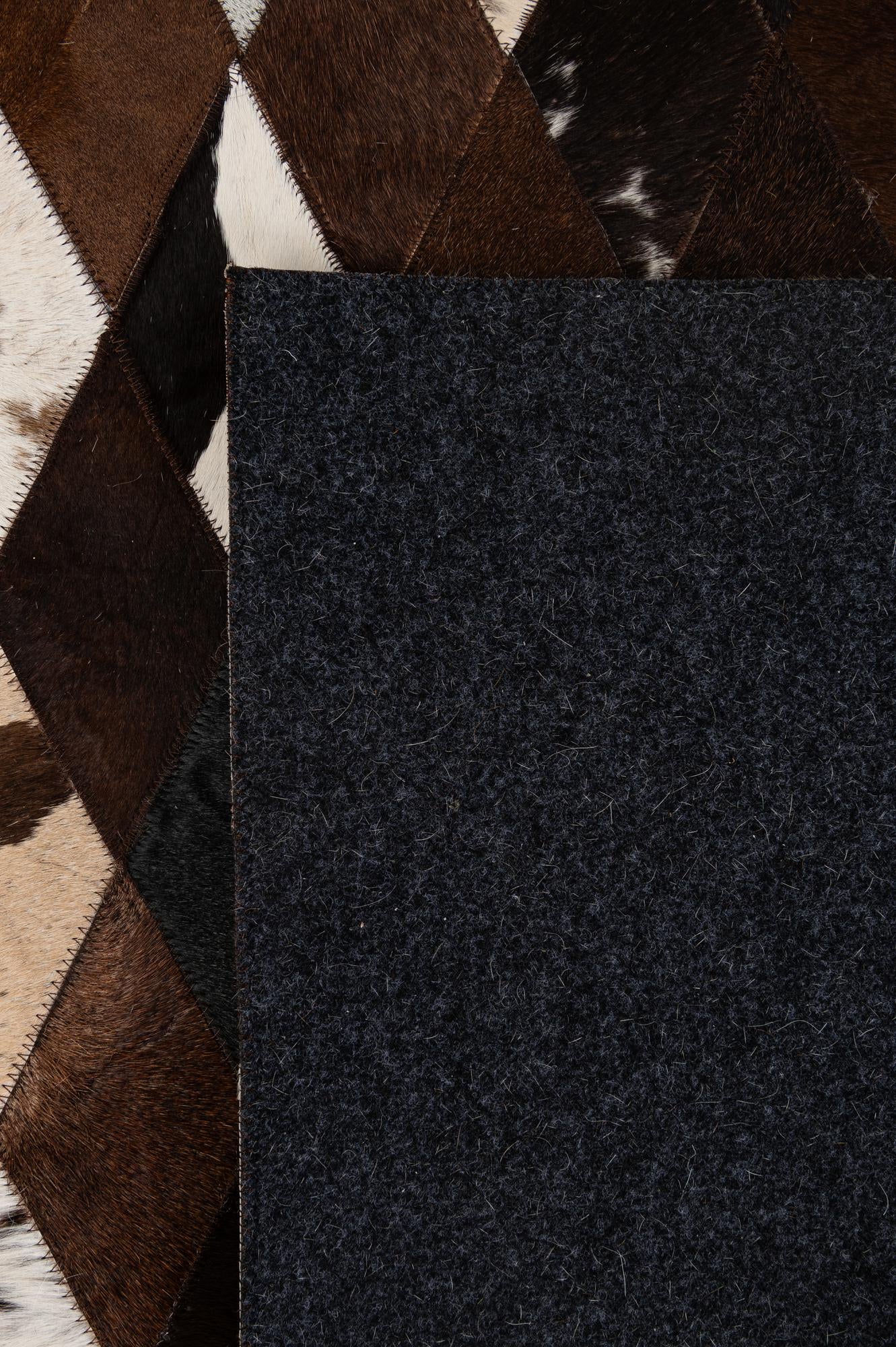 5' 9 x 8' Cowhide - Patchwork Rug