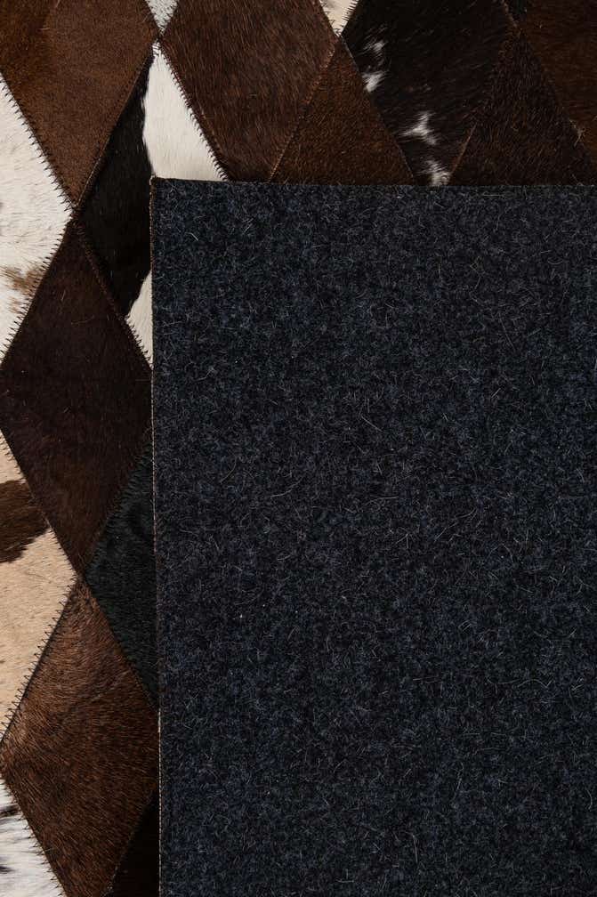 5' 9 x 8' Cowhide - Patchwork Rug