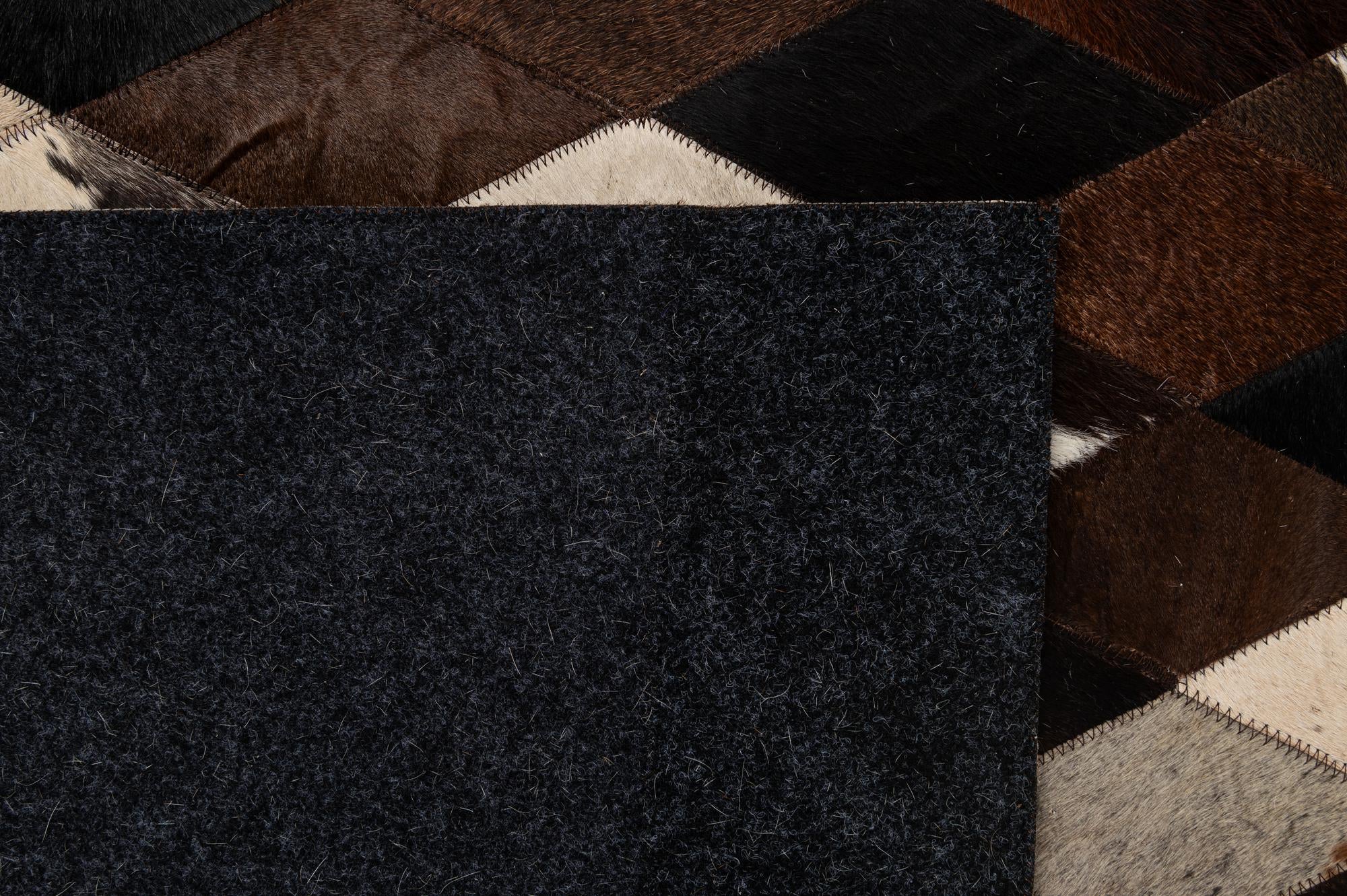 5' 10 x 8' Cowhide - Patchwork Rug