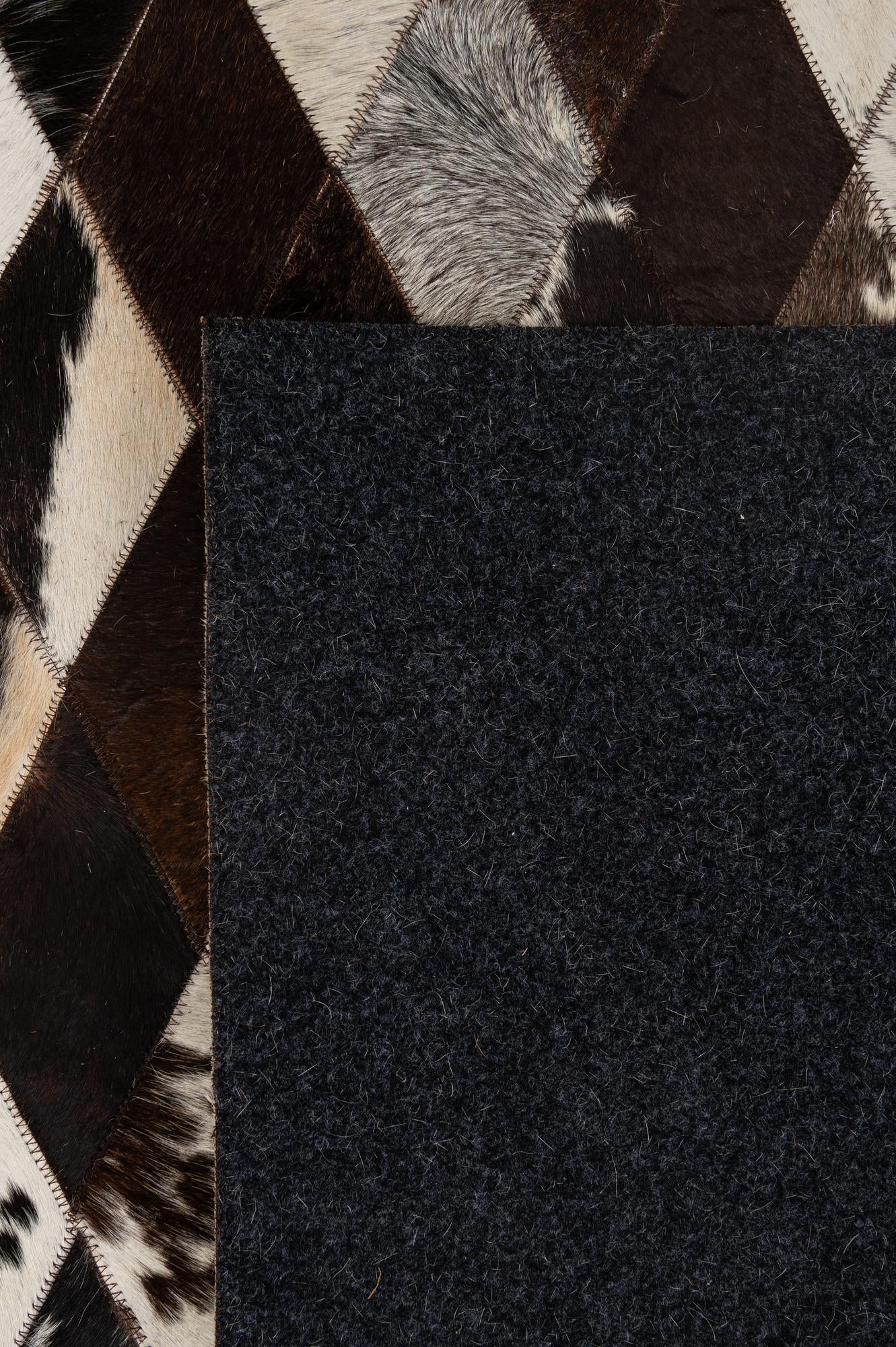 5' 10 x 8' 1 Cowhide - Patchwork Rug