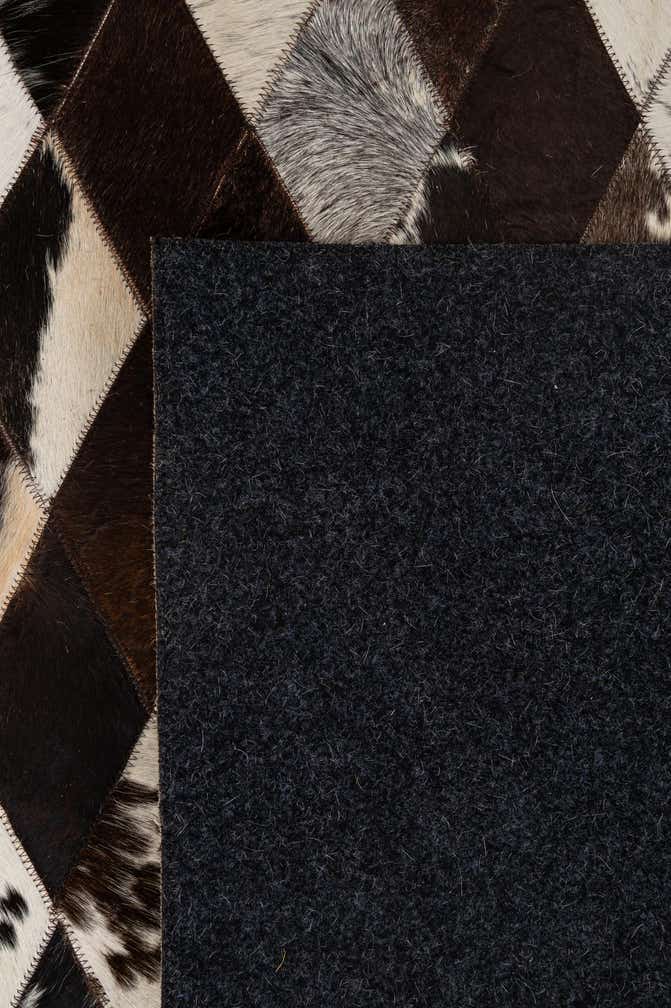5' 10 x 8' 1 Cowhide - Patchwork Rug