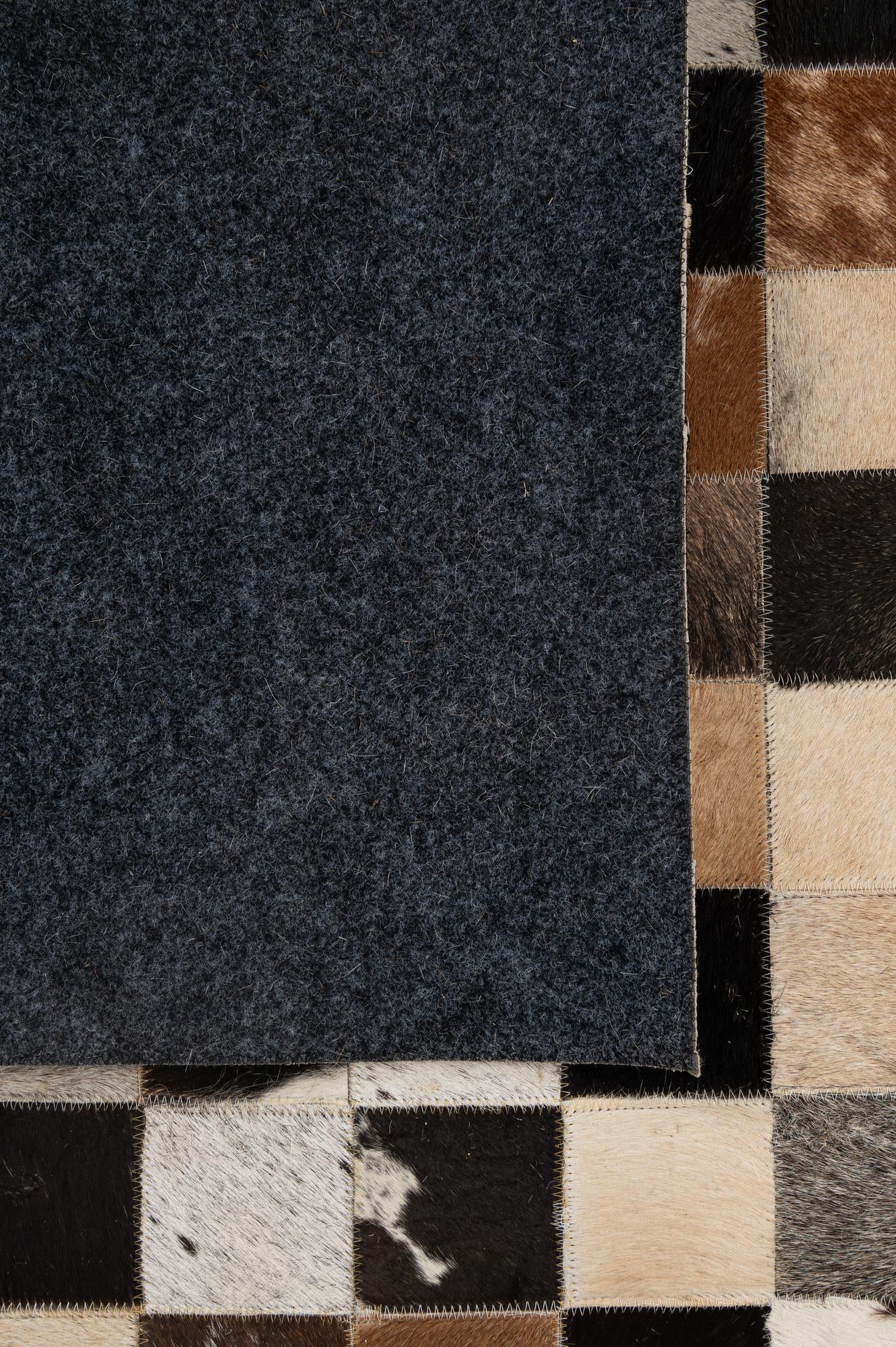 5' 2 x 8' 1 Cowhide - Patchwork Rug