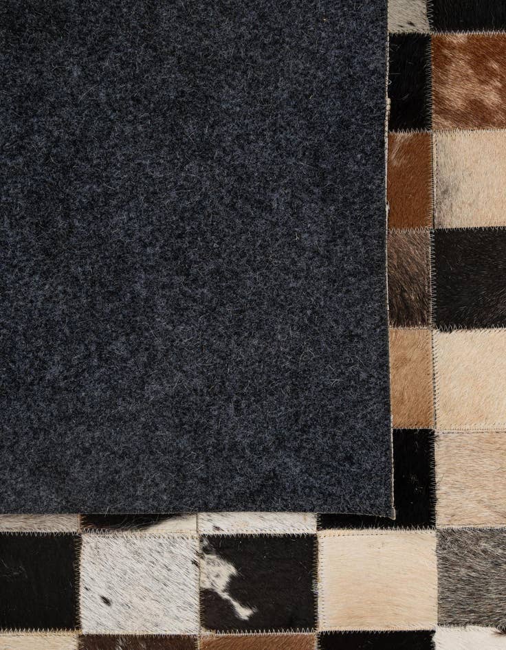 Detail image of 5' 2 x 8' 1 Cowhide - Patchwork Rug