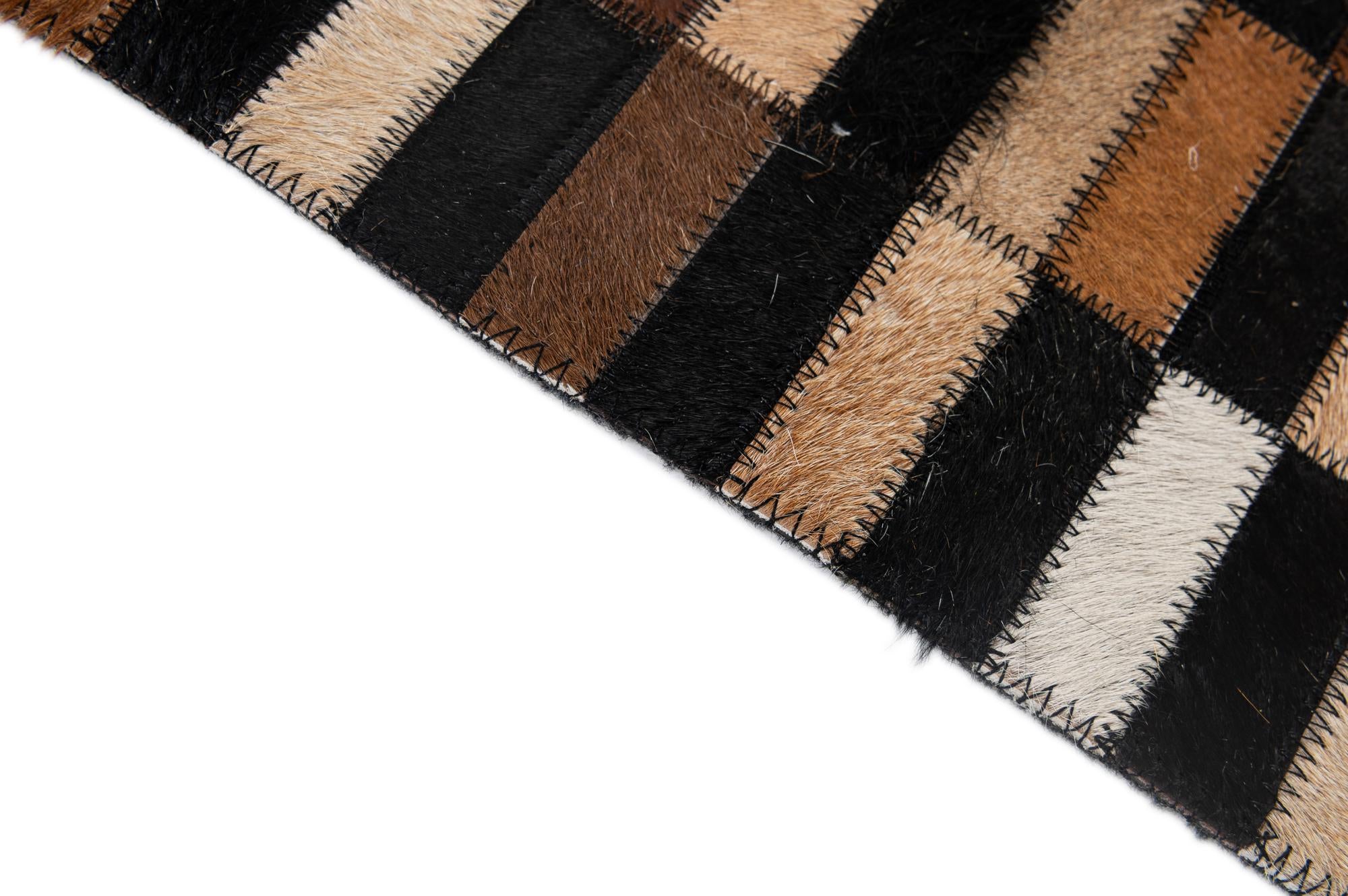 5' 2 x 8' 1 Cowhide - Patchwork Rug