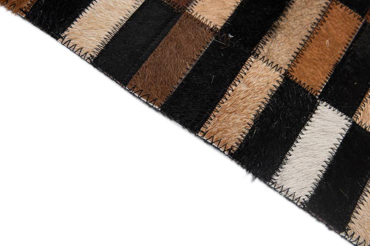 Detail image of 5' 2 x 8' 1 Cowhide - Patchwork Rug