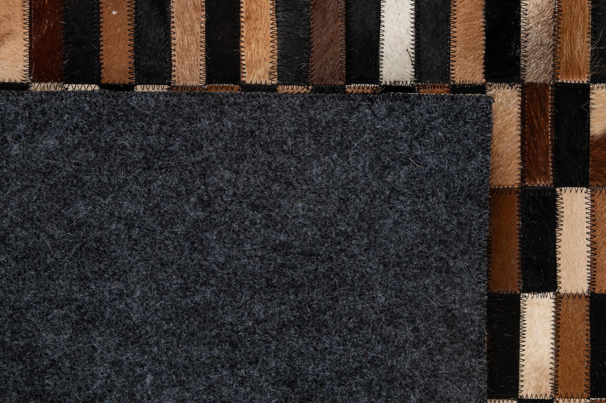 5' 2 x 8' 1 Cowhide - Patchwork Rug