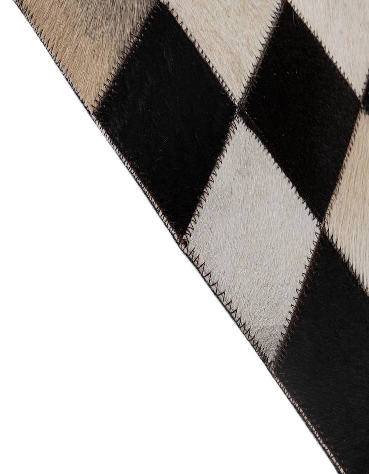Detail image of 4' 11 x 8' 1 Cowhide - Patchwork Rug