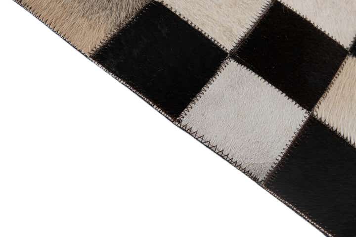 4' 11 x 8' 1 Cowhide - Patchwork Rug