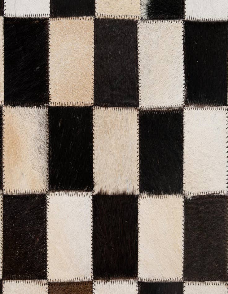 Detail image of 4' 11 x 8' 1 Cowhide - Patchwork Rug