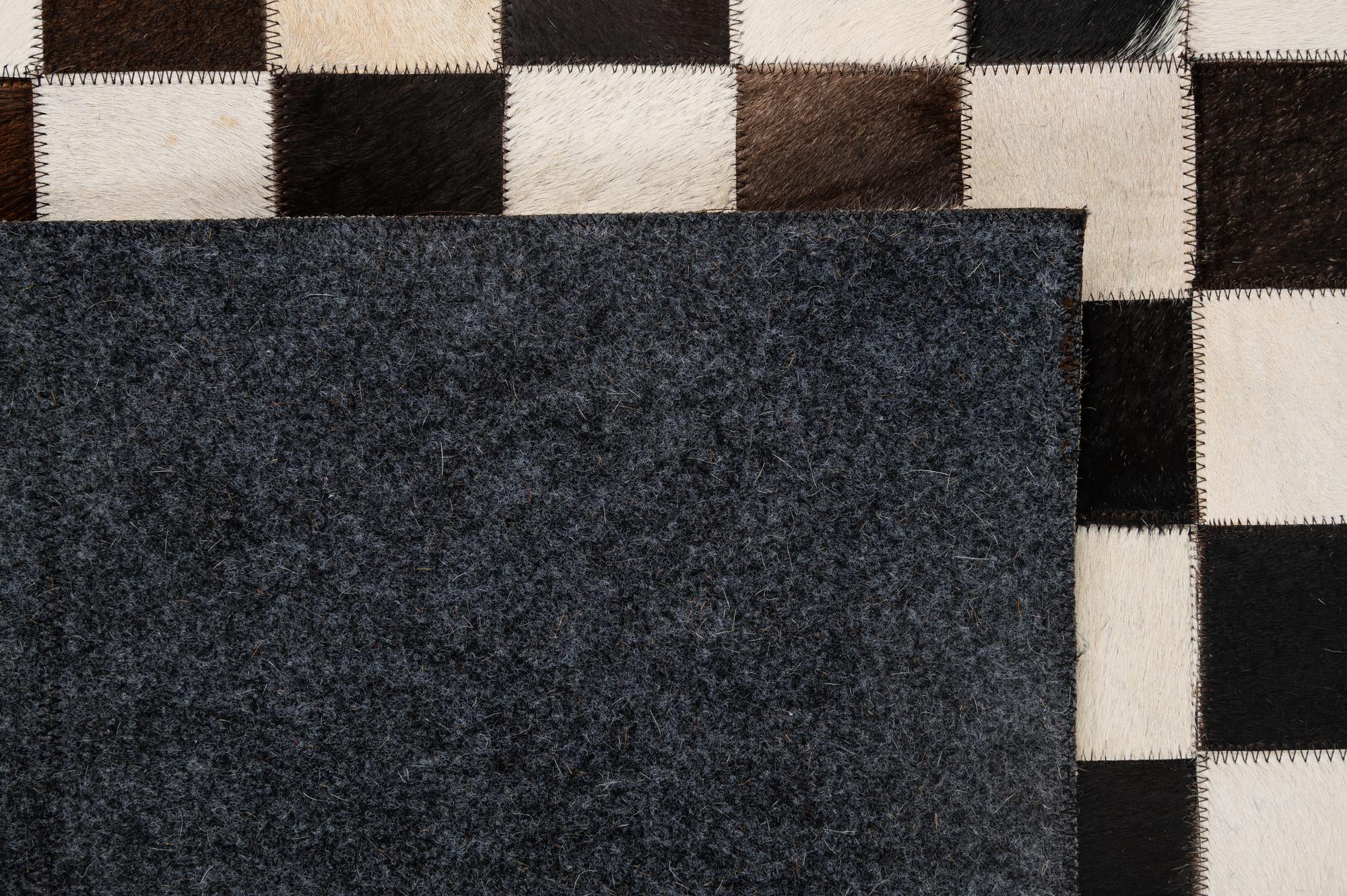 4' 11 x 8' 1 Cowhide - Patchwork Rug