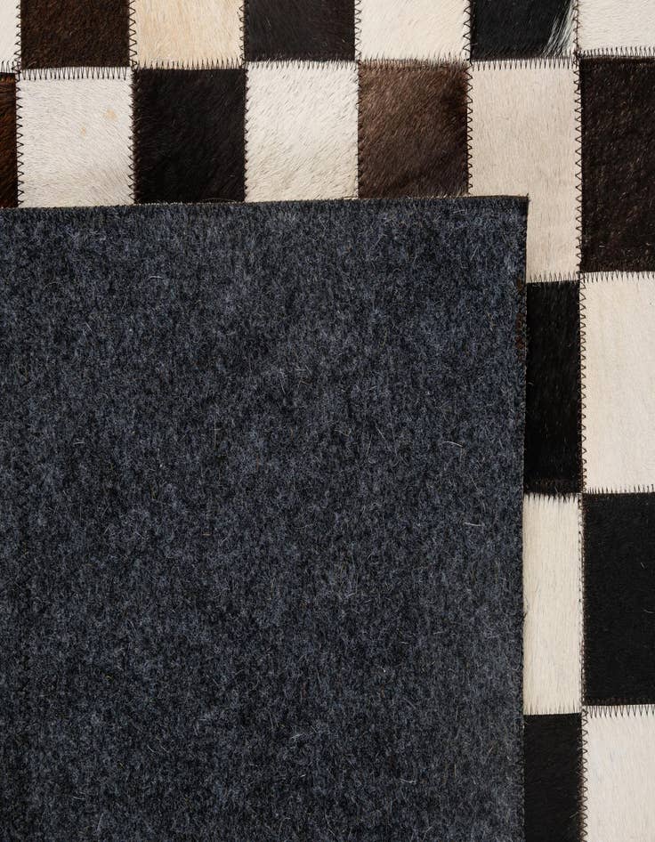 Detail image of 4' 11 x 8' 1 Cowhide - Patchwork Rug