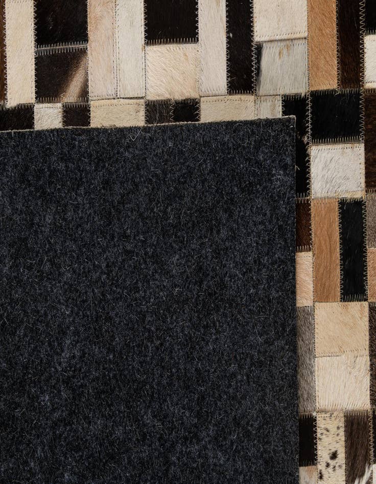 Detail image of 5' 1 x 8' Cowhide - Patchwork Rug