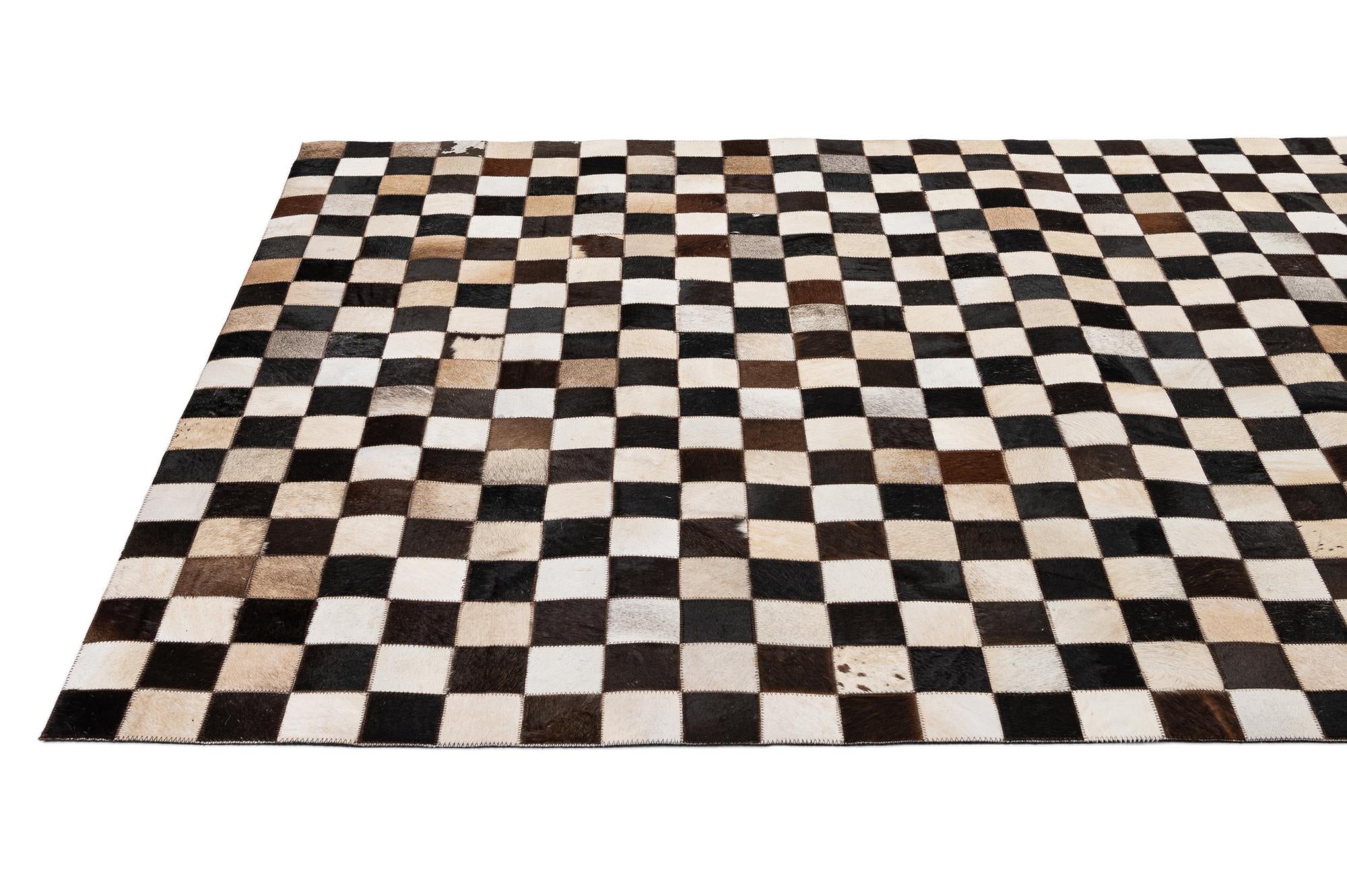 4' 11 x 8' 1 Cowhide - Patchwork Rug