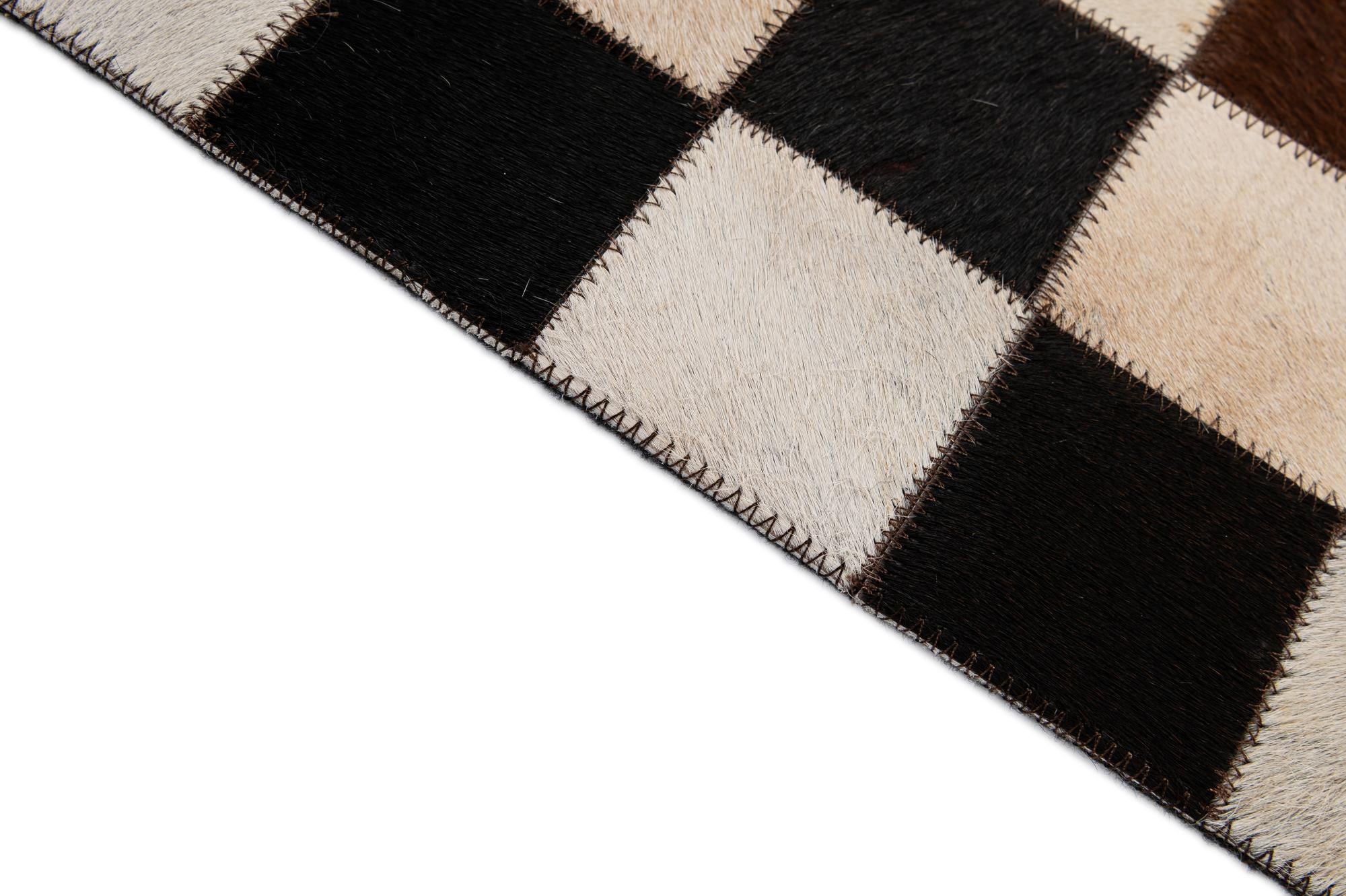 4' 11 x 8' 1 Cowhide - Patchwork Rug