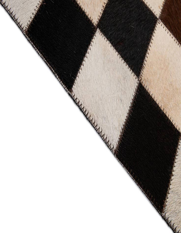 Detail image of 4' 11 x 8' 1 Cowhide - Patchwork Rug