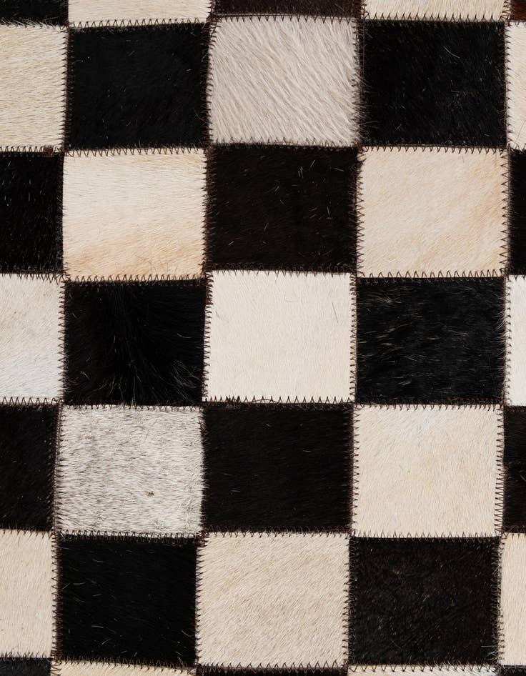 Detail image of 4' 11 x 8' 1 Cowhide - Patchwork Rug